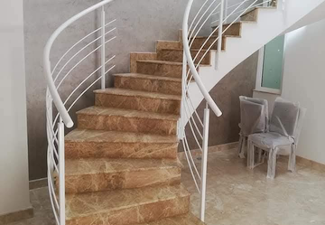 White Grace: The Modern Curved Stair Railing